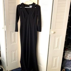 Long 3/4 sleeve black dress.